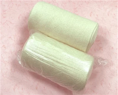 ผ้าเนื้อแกะม้วน stockinette ออกทิ้งผ้าสำลีหรือตกค้างหลังการใช้งานหรือไม่?